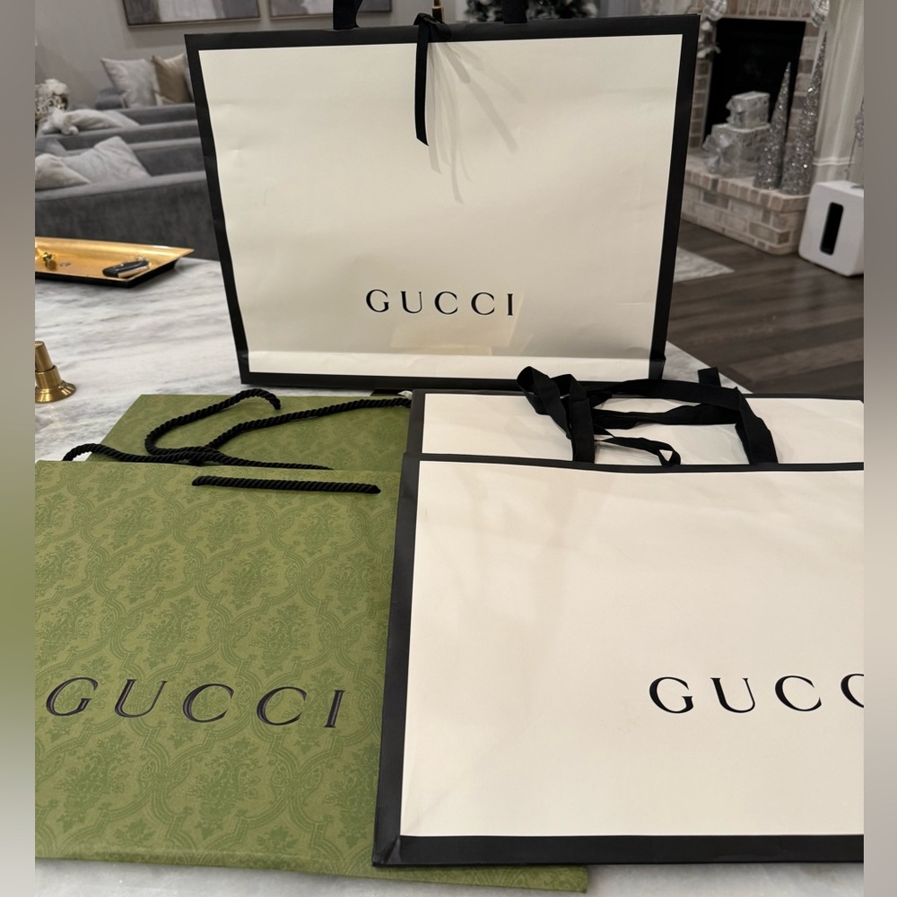 5 Large Gucci Shopping Bags. Approximately 14x19 inches.